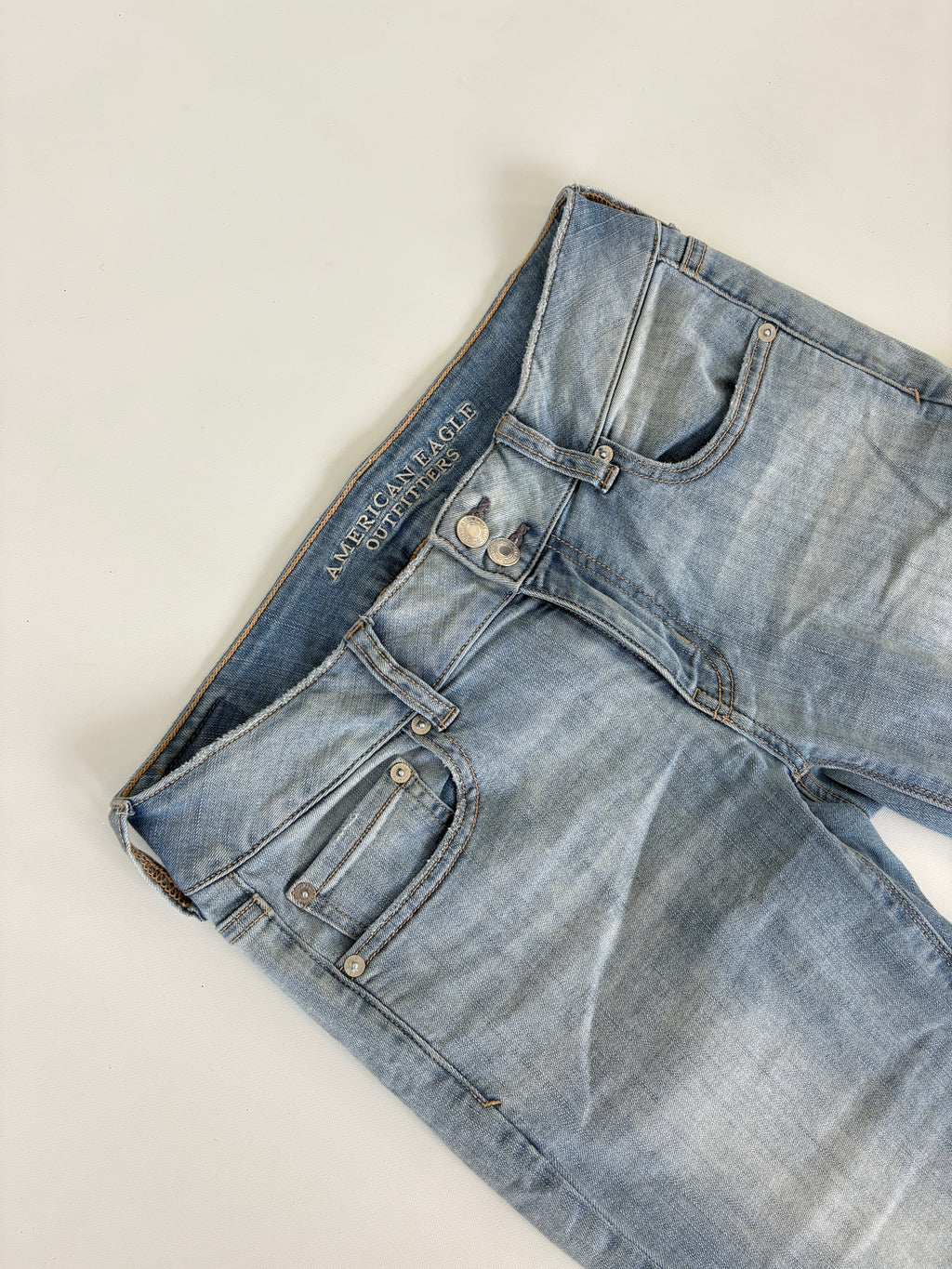 446 / Light Wash Mini Flare American Eagle Jeans w/ Double Button