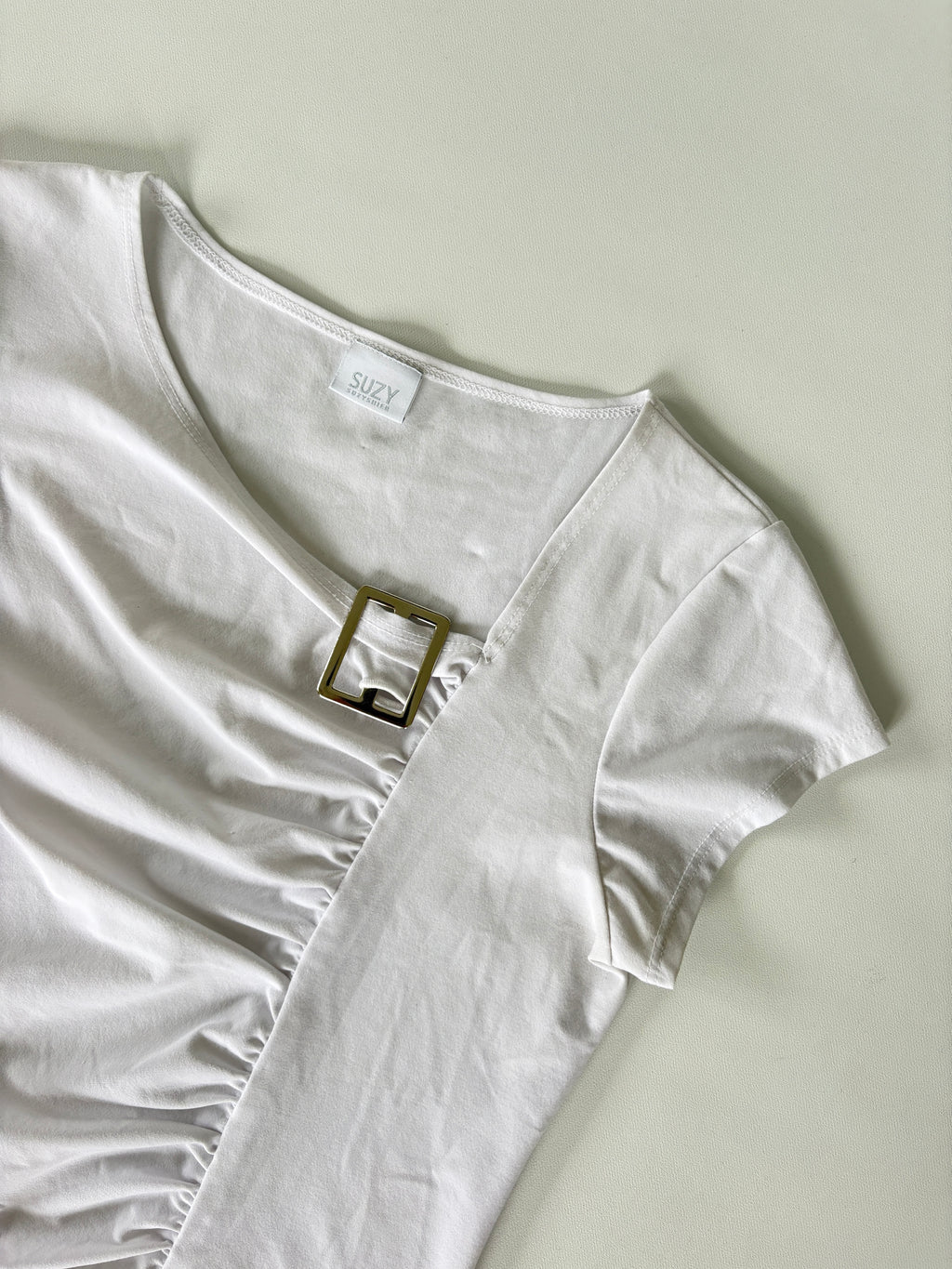 61 / White Asymmetrical Cropped Top w/ Ruching and Buckle Detail